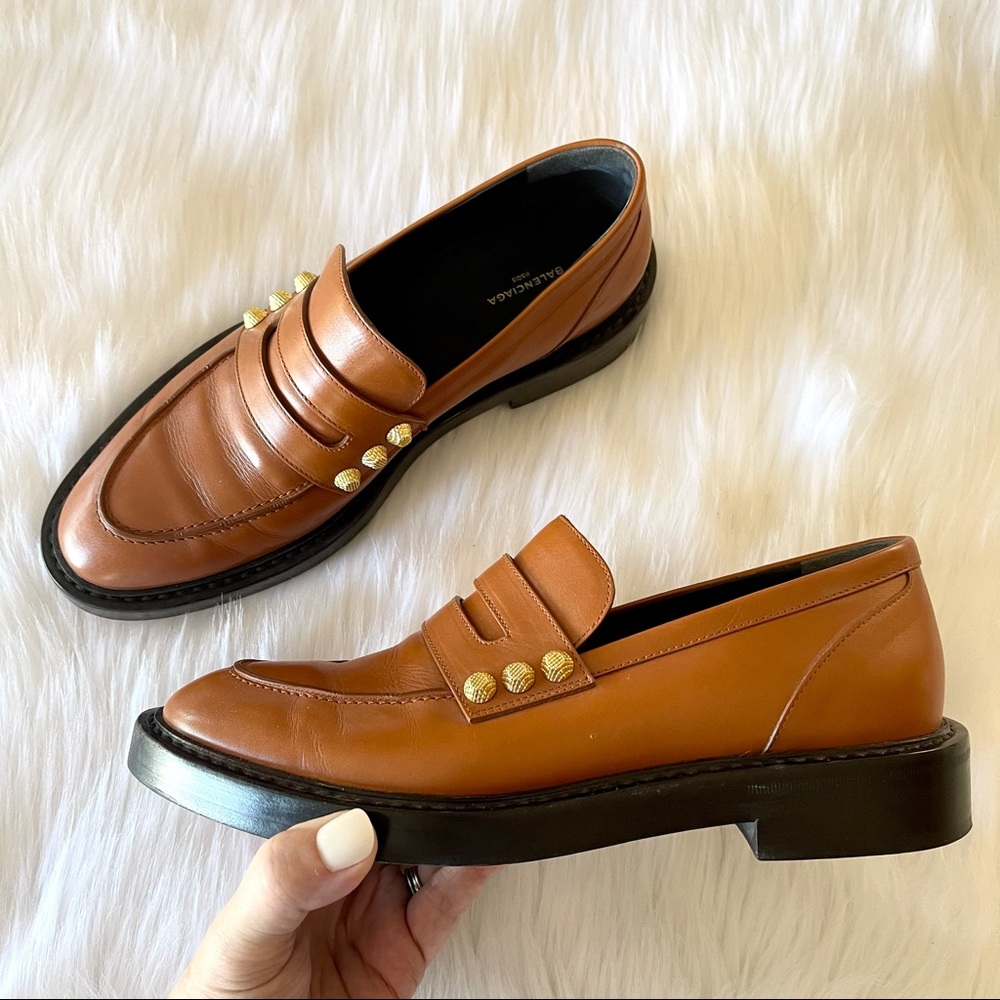 Warm brown Balenciaga gold studded leather loafers